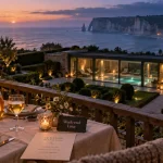 week end luxe normandie : table terrasse, spa vitré et mer au loin
